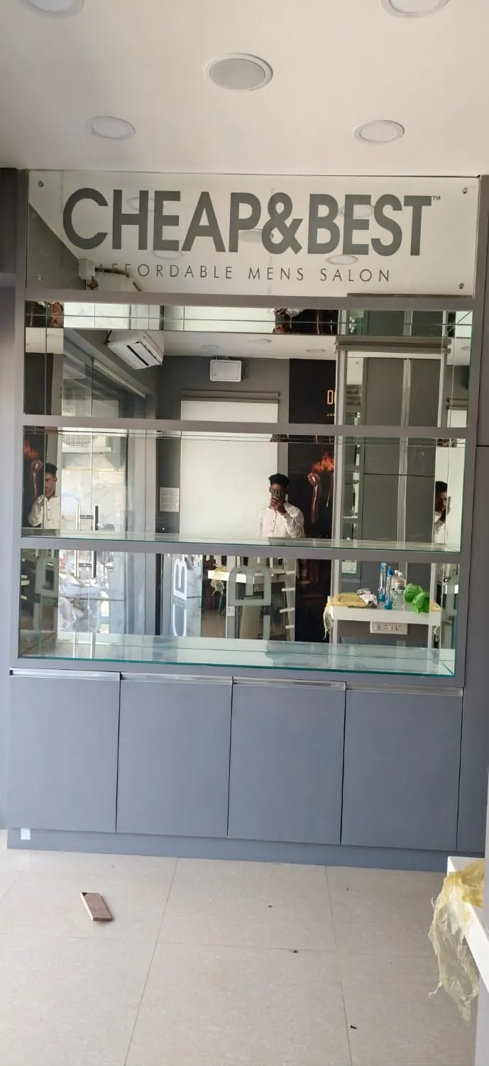 Custom-designed salon mirrors with integrated glass shelving units, installed for a high-end professional beauty studio by Fashion Elite.